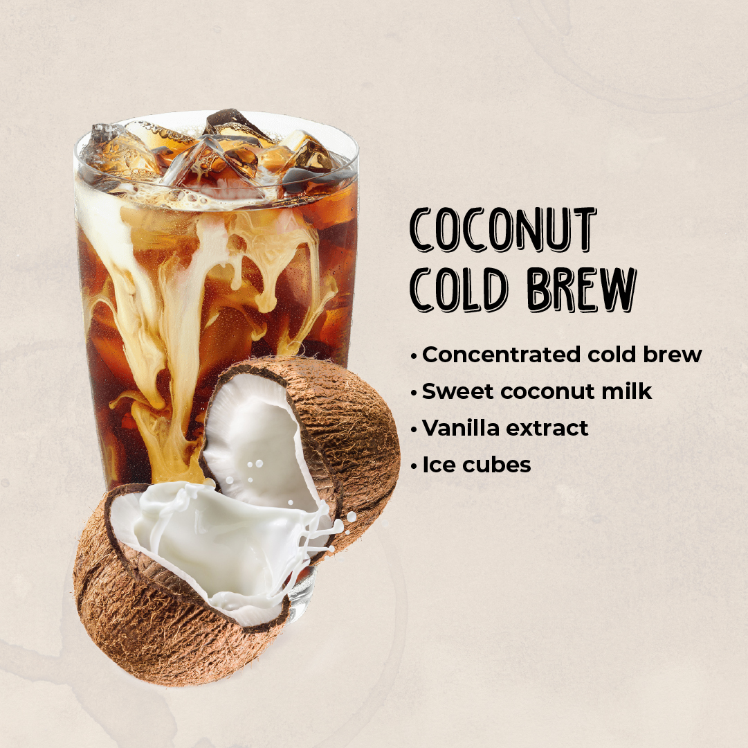 A glass filled with creamy Coconut Cold Brew, showcasing a blend of cold brew coffee, coconut milk, and ice cubes, offering a tropical twist on a summer coffee drink.