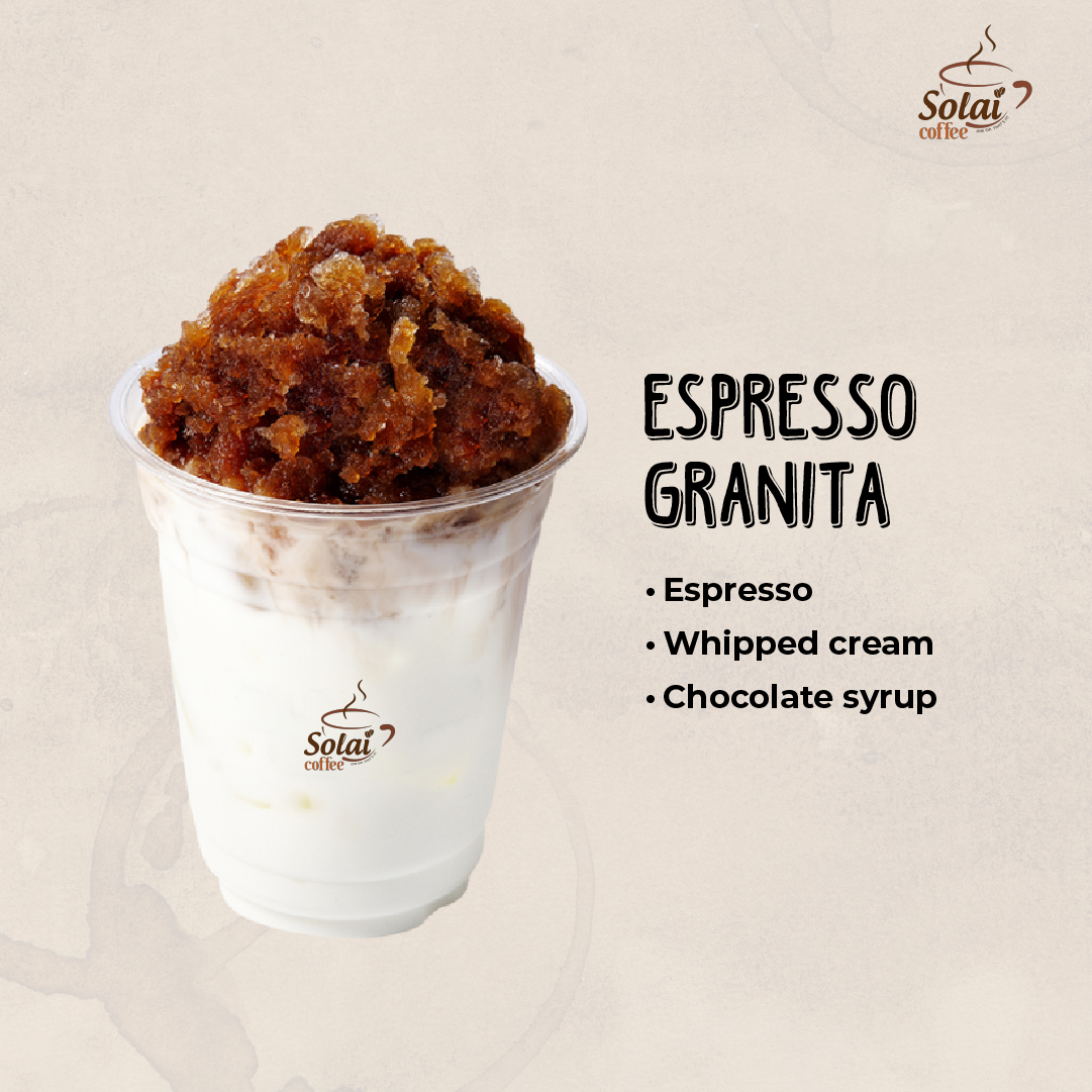Espresso Granita served in a shallow dish, topped with whipped cream and drizzled with chocolate syrup, a refreshing summer coffee dessert.